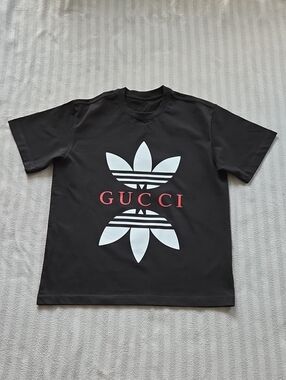 Gucci Black Tee with White Graphic and Red Logo